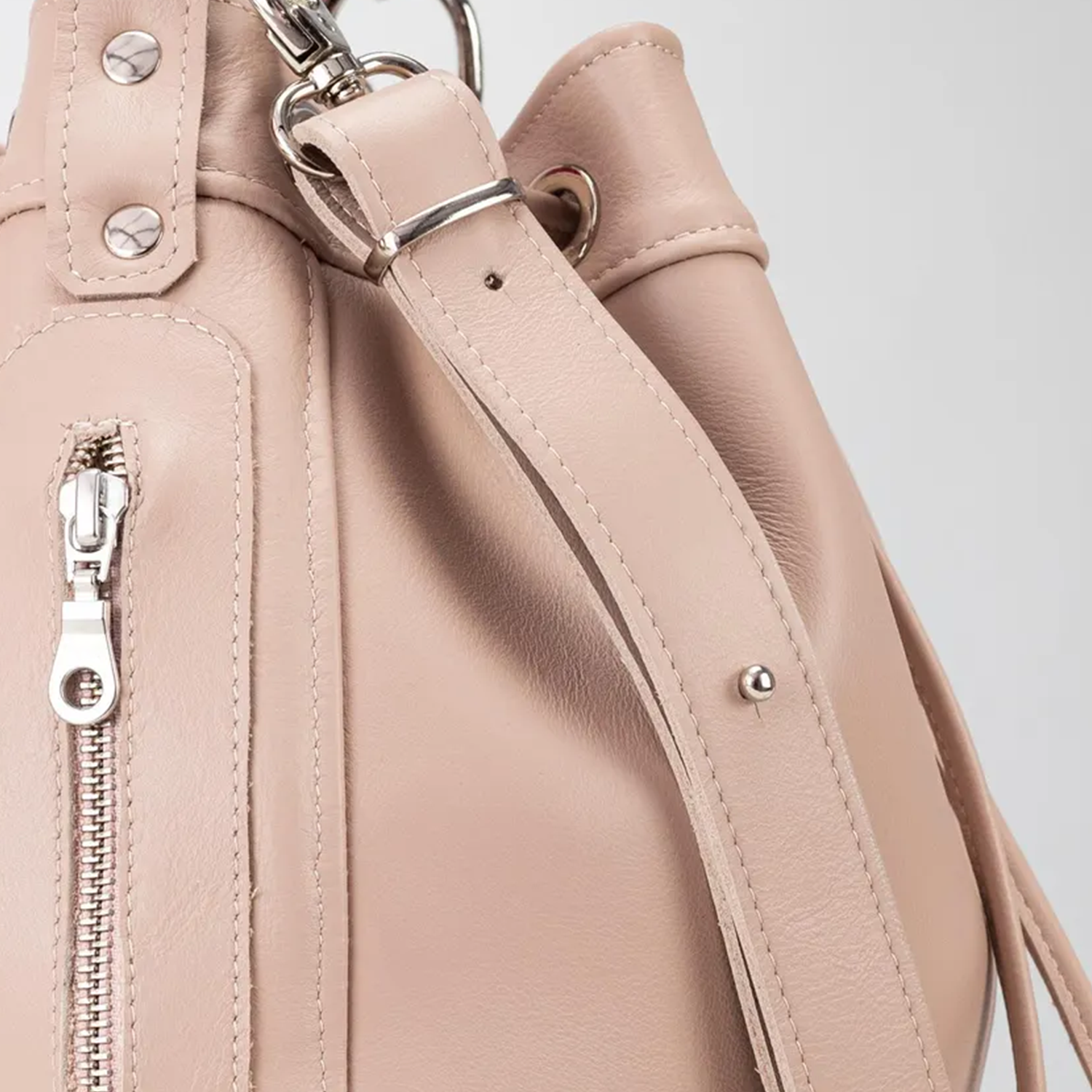 Blush Neutral Soft Cinch Bucket Purse With Detachable Carry Loops, Dual Outer Zip Compartments And Structured Flat Base Silhouette Drawstring Bag