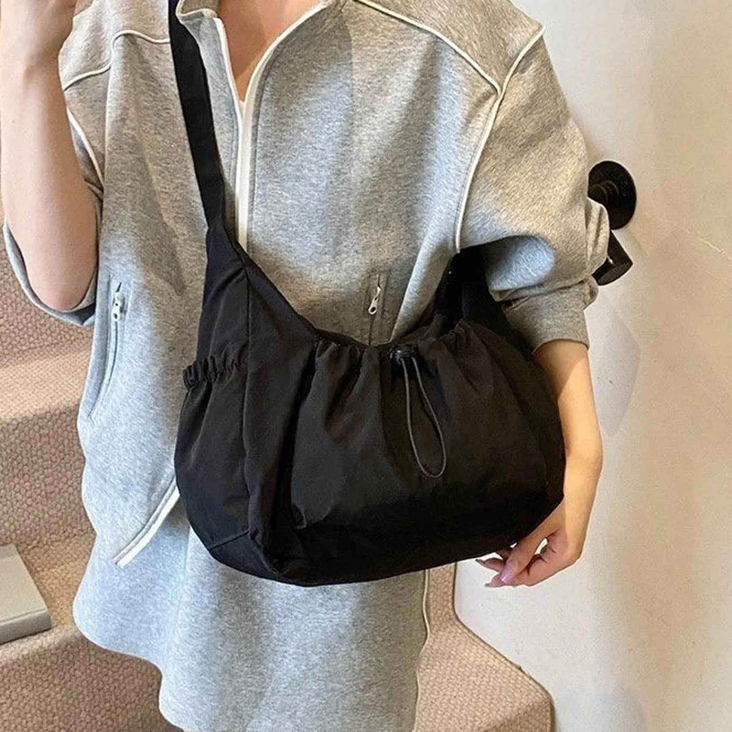 Drawstring Hobo Carry Bag With Flank Slip Storage Pockets, Extended Draping Shoulder Band And Soft Unstructured Slouch Silhouette