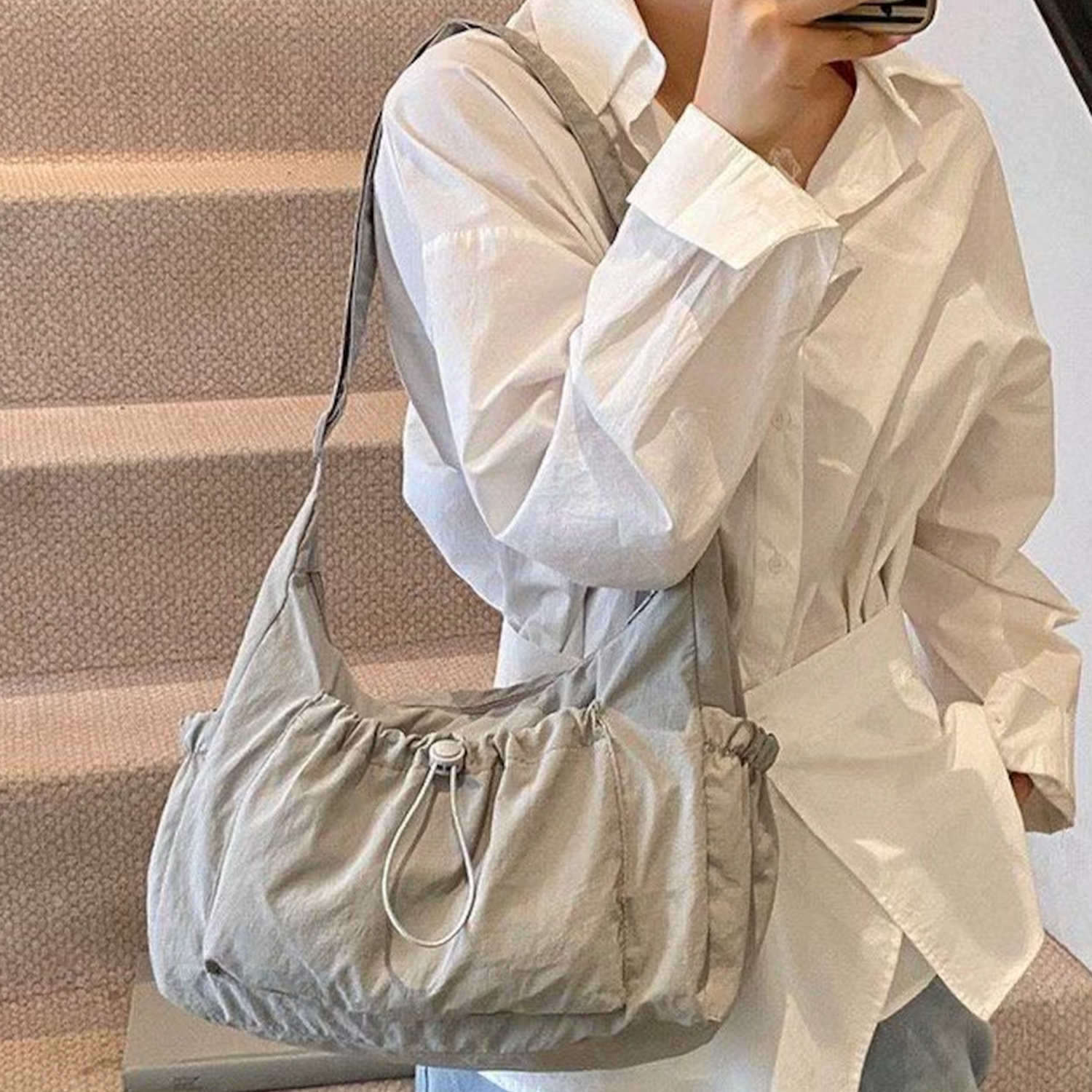 Drawstring Hobo Carry Bag With Flank Slip Storage Pockets, Extended Draping Shoulder Band And Soft Unstructured Slouch Silhouette